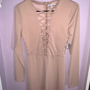 Charlotte Russe long sleeve champagne colored dress that comes to mid thigh